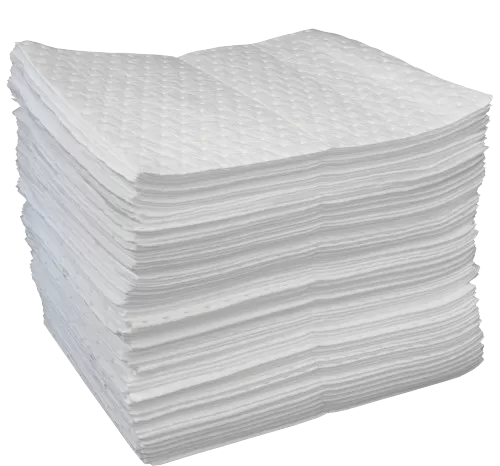 oil absorbent pads laid out for industrial spill cleanup